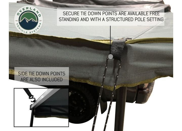 270-Degree Nomadic Awning with Dark Gray Canopy and Black Driver Side Transit Cover