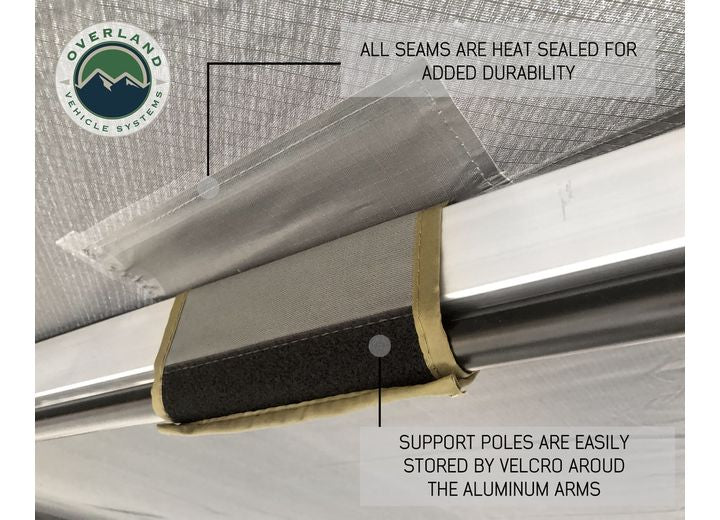 270-Degree Nomadic Awning with Dark Gray Canopy and Black Driver Side Transit Cover