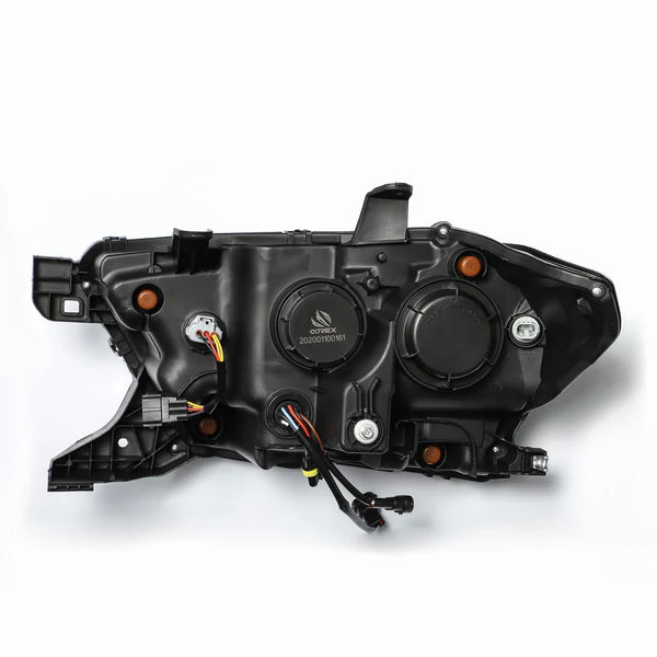 A black automotive headlight assembly component with several round housings, wires, and connectors visible on its backside. The image is on a plain white background, showcasing the detailed structure and various attachment points of the AlphaRex USA NOVA-Series LED Projector Headlights in Mid-Night Black for the 2016-2023 Toyota Tacoma (SKU: 880705).