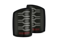 Introducing the 14-18 Sierra 1500/2500/3500HD LUXX LED Tail Lights by AlphaRex USA. These tail lights feature a modern, wavy, horizontal design with multiple light segments set within an alpha-black housing. The bottom portion includes a red reflective section, adding both style and functionality to your vehicle.