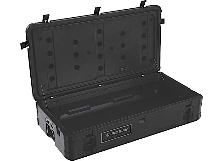 A large, black, rectangular Pelican Large 140L Cargo Case for Roof Storage - Durable Black Outdoor Gear Protector with its lid open, revealing a spacious interior. The lid has foam padding with holes for securing items and two metal support arms. Sturdy locks and a handle are visible on the exterior, making it perfect for outdoor adventures or roof storage.