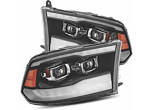 Upgrade your RAM 1500HD/2500/3500HD (09-18/10-18) with the stylish and modern AlphaRex USA LUXX Series LED Projector Headlights in a black housing with clear lens. These headlights feature integrated LED daytime running lights, dual projector beams, and amber turn signal sections on the side for enhanced visibility and design.