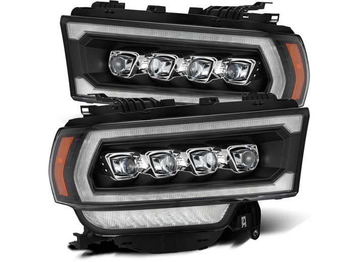 The RAM 2500 19-22 Nova-Series LED Projection Headlights Black with Activation Light by AlphaRex USA are rectangular, modernly designed headlights featuring three clear LED bulbs in black housing. Each unit includes a white LED outline and an amber turn signal strip on the side for enhanced visibility, arranged vertically in the image.