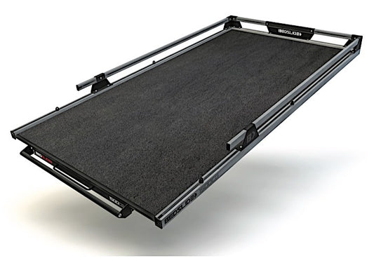 The Bedslide 1500LBS CAPACITY 95INx48IN WEATHERDECK in black and gray, featuring a 3/4 extension and metal guardrails, makes loading and unloading cargo effortless. Displayed partially extended, this versatile truck bed slide is engineered to meet the demands of any transport task seamlessly.