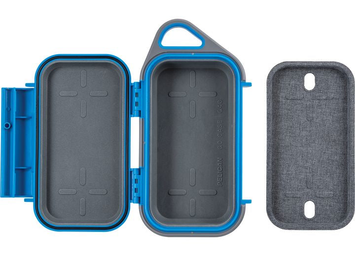 A Pelican Go Case G40 in Surf Blue and Grey is shown with its lid open, revealing its interior compartments. Constructed from impact-resistant materials, the lid is securely attached with a hinge. The case also features a removable fabric-lined panel alongside it. The triangular handle can be seen at the top of this waterproof protection case from Pelican.