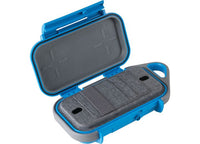 The Pelican Go Case G40 in durable Surf Blue/Grey offers waterproof protection for your gear, featuring a hard outer shell and a padded gray lining with compartments and elastic straps for securing small items. Constructed from impact-resistant materials, this Pelican case also includes a built-in carabiner for easy attachment.