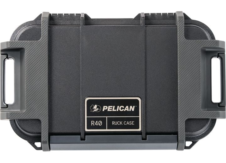 The Pelican Ruck Case R40, a rugged and waterproof utility backpack in a sleek black design, is crafted from high-quality materials. It features sturdy latches, reinforced corners, and a central logo plate proudly displaying the Pelican brand name and logo. Compact and portable, this durable and versatile case is perfect for protecting valuable items.