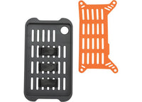 Two rectangular objects are displayed: a gray panel with slots and straps on the left and an orange, similarly slotted panel without straps on the right. Both panels have rounded edges, and the gray panel features a circular cutout in the top corner. Ideal for outdoor enthusiasts who use products like the Pelican Ruck Case R40 - a durable OD green tactical backpack with a water-resistant design from Pelican.